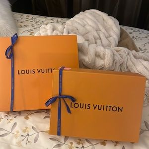 Gucci and Louis Vuitton gift boxes. Some with dust covers. Various sizes.